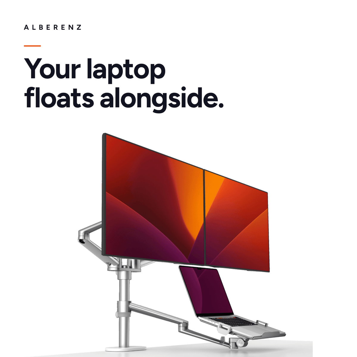Alberenz dual monitor arm with laptop tray, silver: laptop on the tray next to the screens