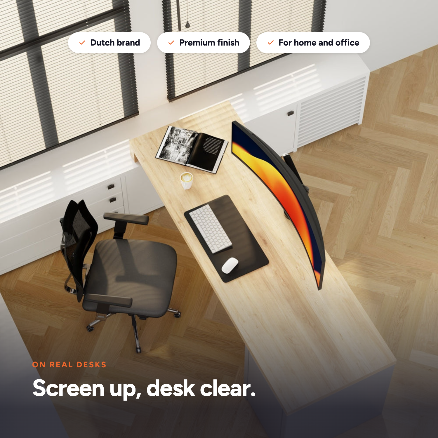 Alberenz Heavy Duty gas spring monitor mount on a real desk with the screen raised